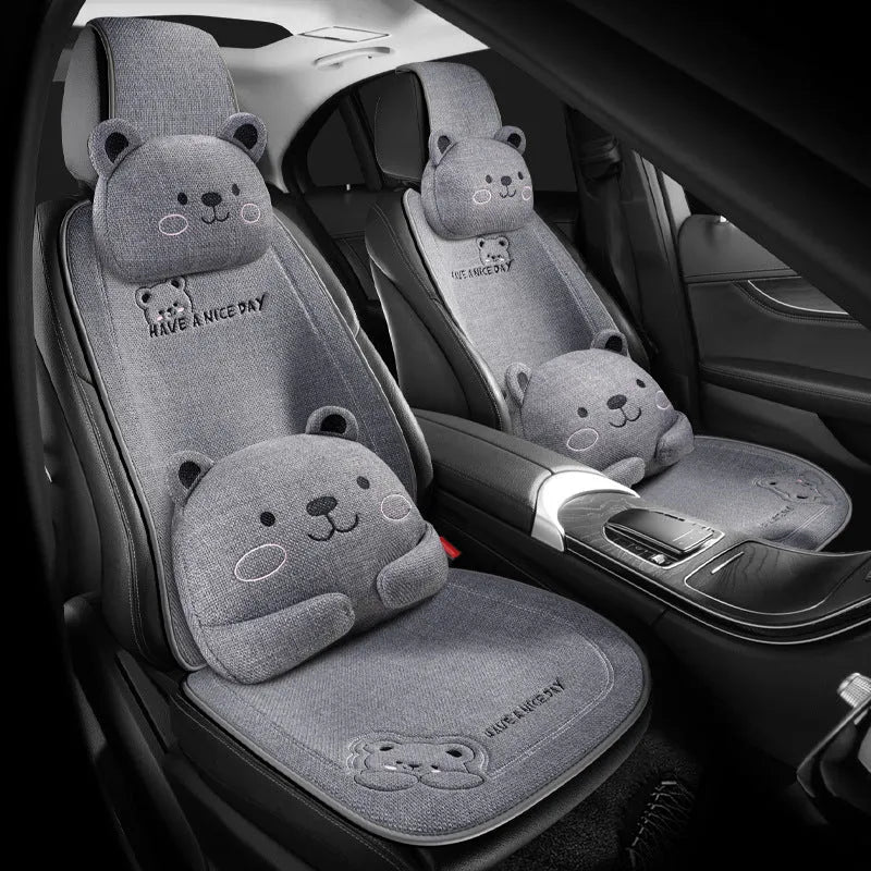 Car seat cushion set showing headrest pillow and lumbar support pillow in linen covers