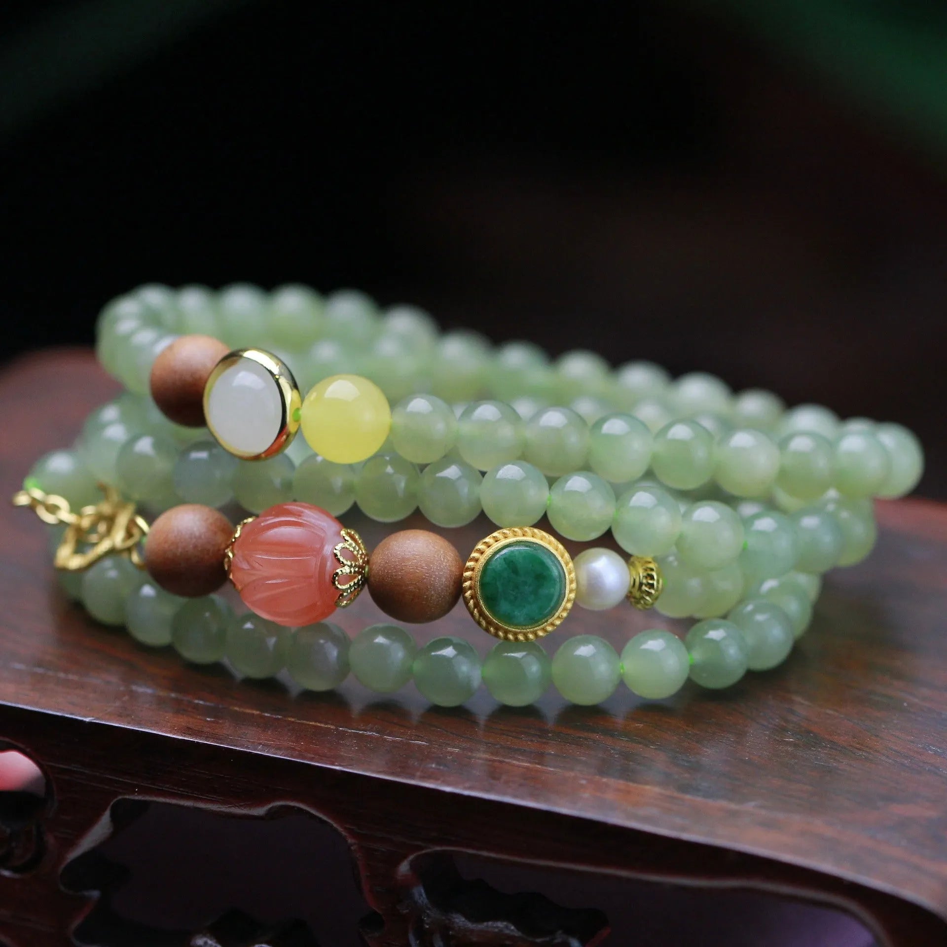 Hetian jade lotus bead necklace with white sandalwood beeswax pendant and fu character charm