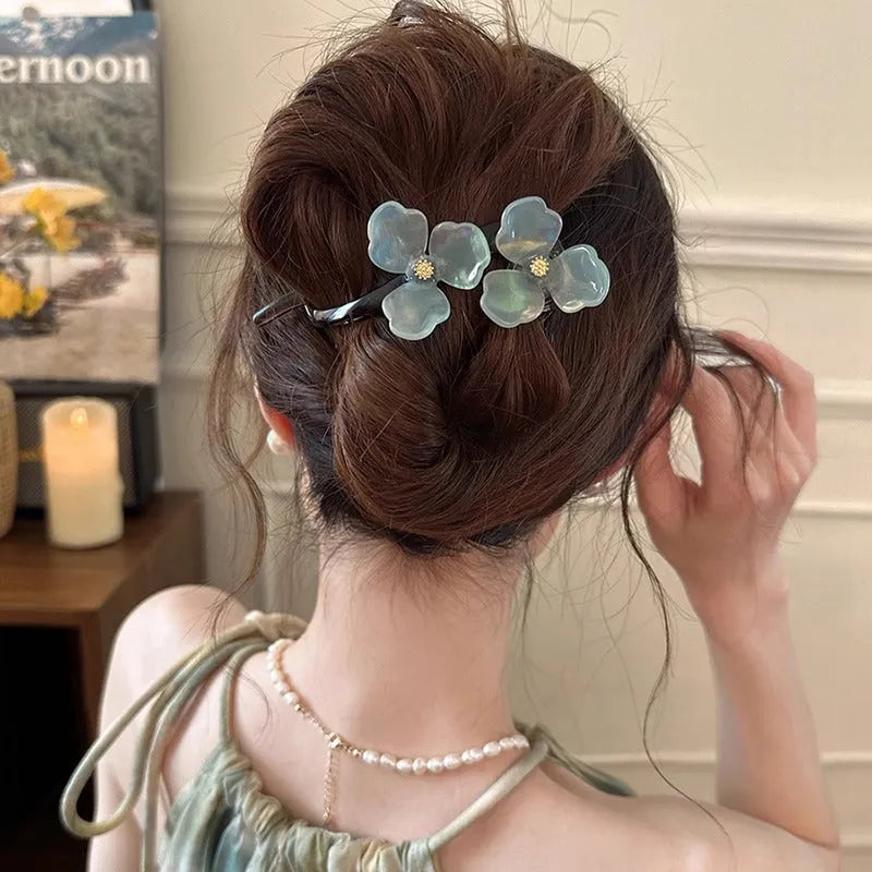 Retro flower design bobby pin hair accessory with acrylic petals in blue, beige, or pink.