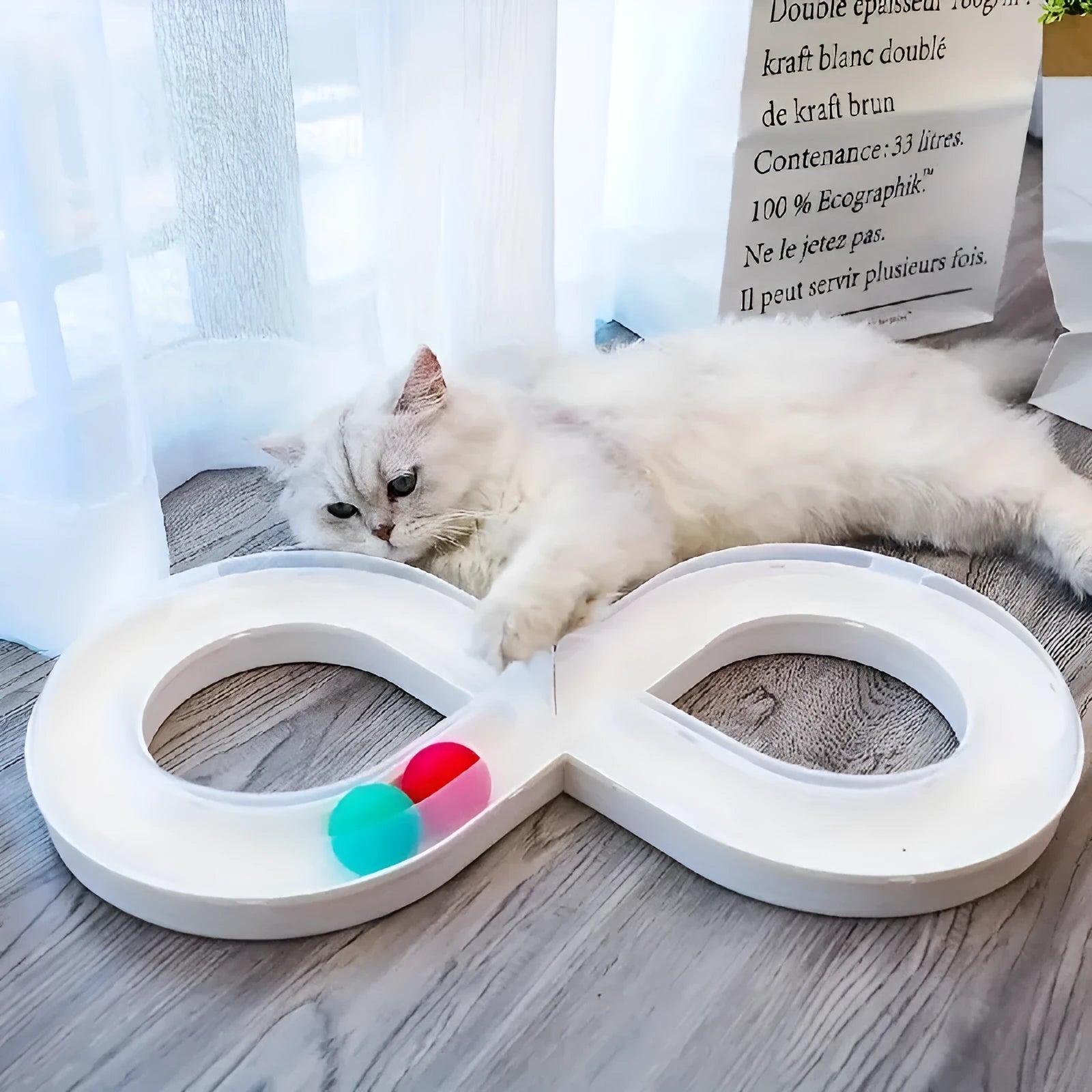 Blue and white cat toy set with turntable track, teasing stick, and four balls.