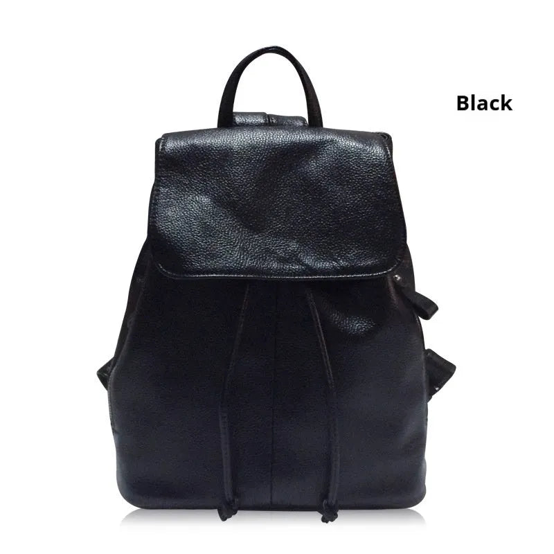 Black genuine leather women's backpack with street trend style and multiple internal pockets.