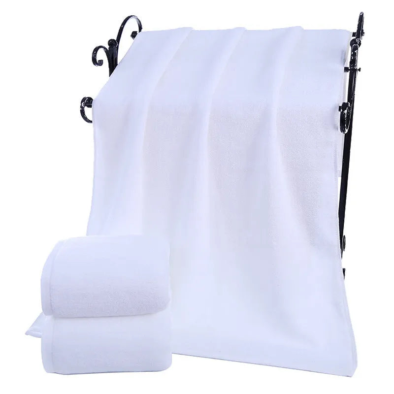 White thickened cotton bath towel measuring 100x200cm weighing 800g with plain weave texture