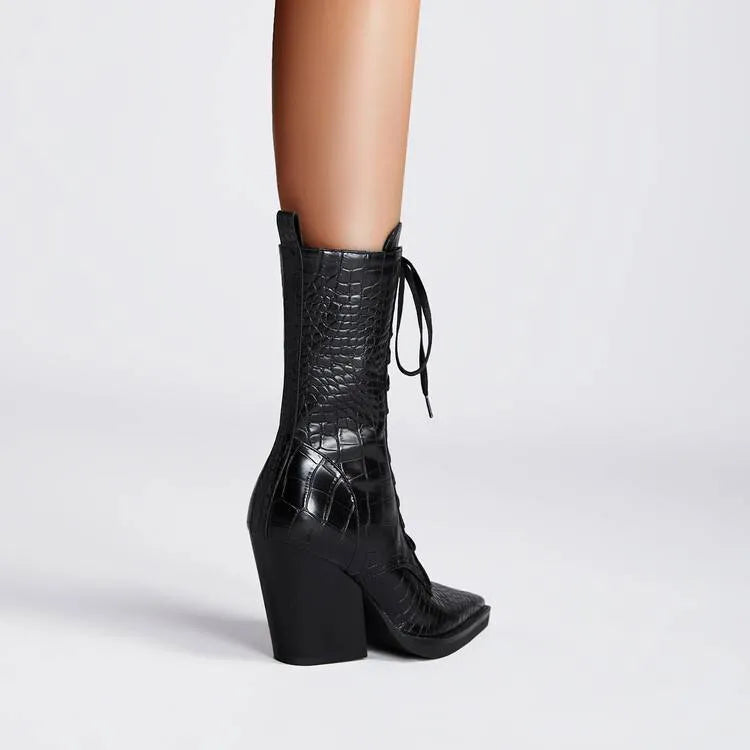 Dark brown retro pointed toe ankle boots with lace detailing and a chunky heel on a white background.