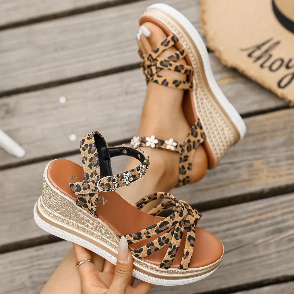 Light brown suede women's platform sandals with an ankle strap and buckle.