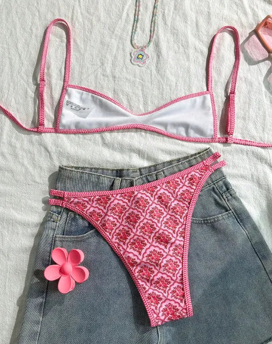 Pink printed two-piece swimsuit with shoulder straps and exposed back, top and shorts set, sizes S M L XL