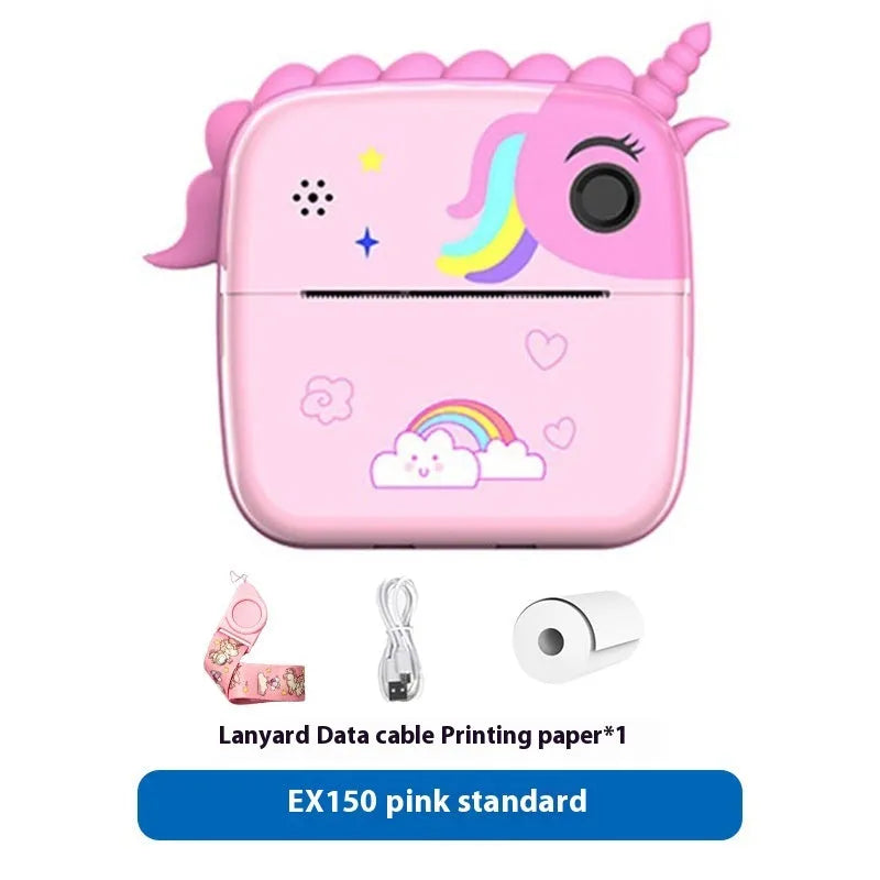 Pink children's handheld SLR toy camera with double lens on a table.