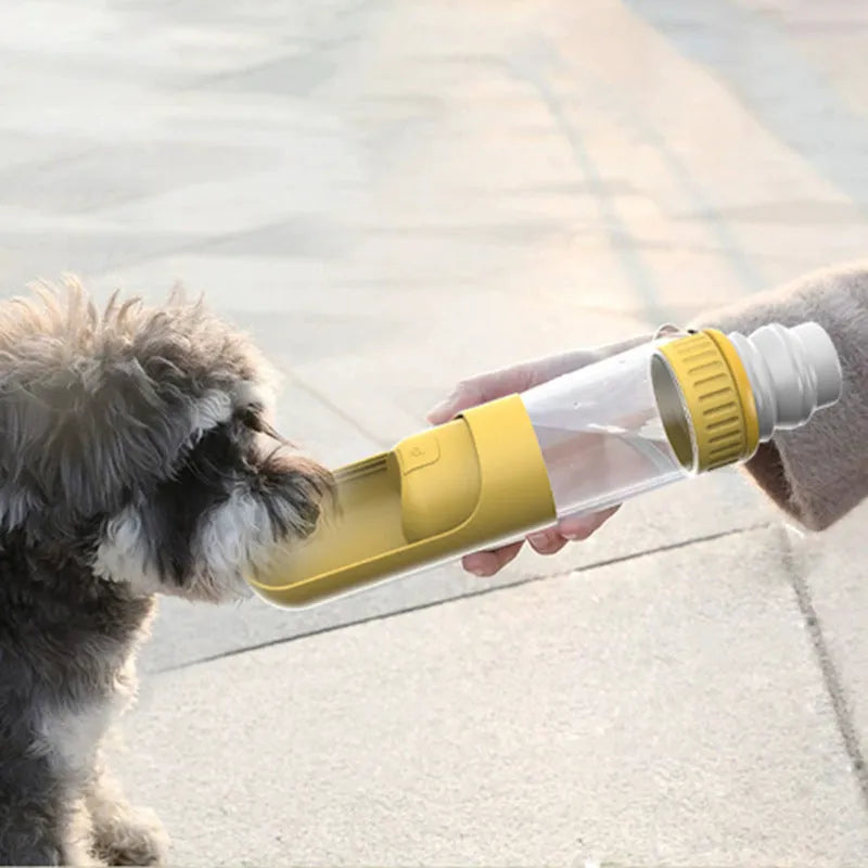 Dark blue portable dog water bottle with built-in drinking bowl, showing leak-proof cap.