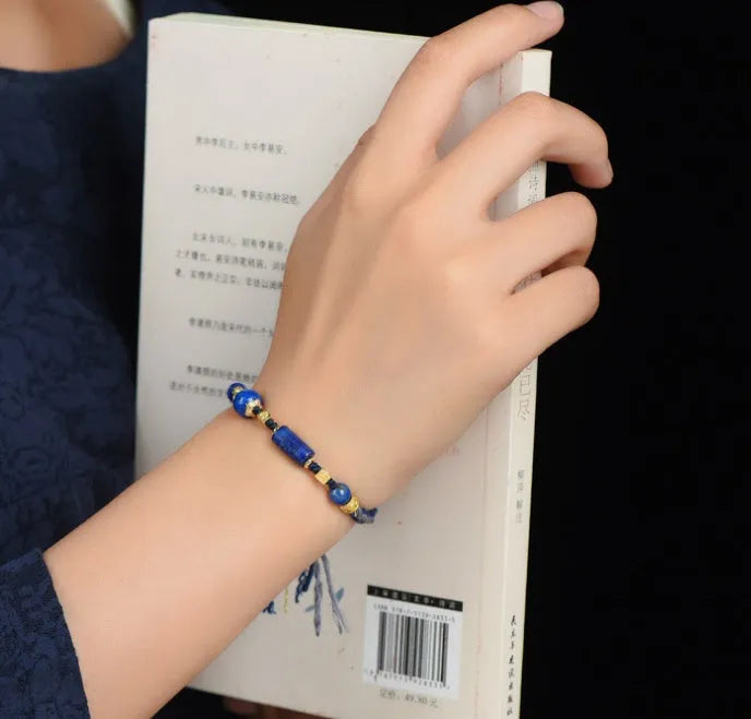 Hand woven ethnic bracelet with lapis lazuli colour and rope design on flexible wire