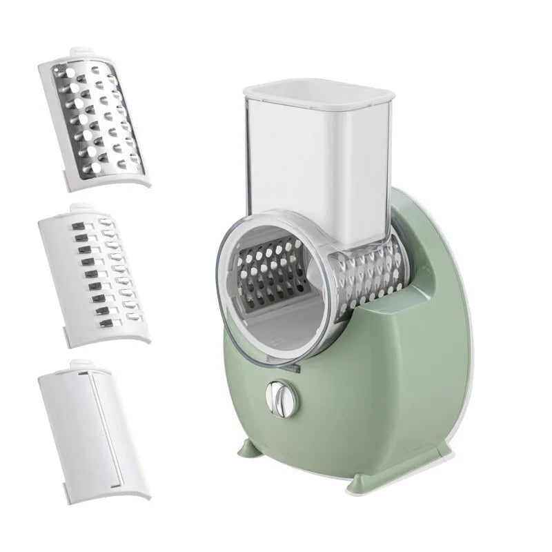 White electric vegetable slicer with interchangeable blades and suction base on kitchen counter