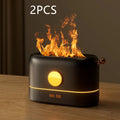 Black USB humidifier with flame simulation effect on wooden desktop