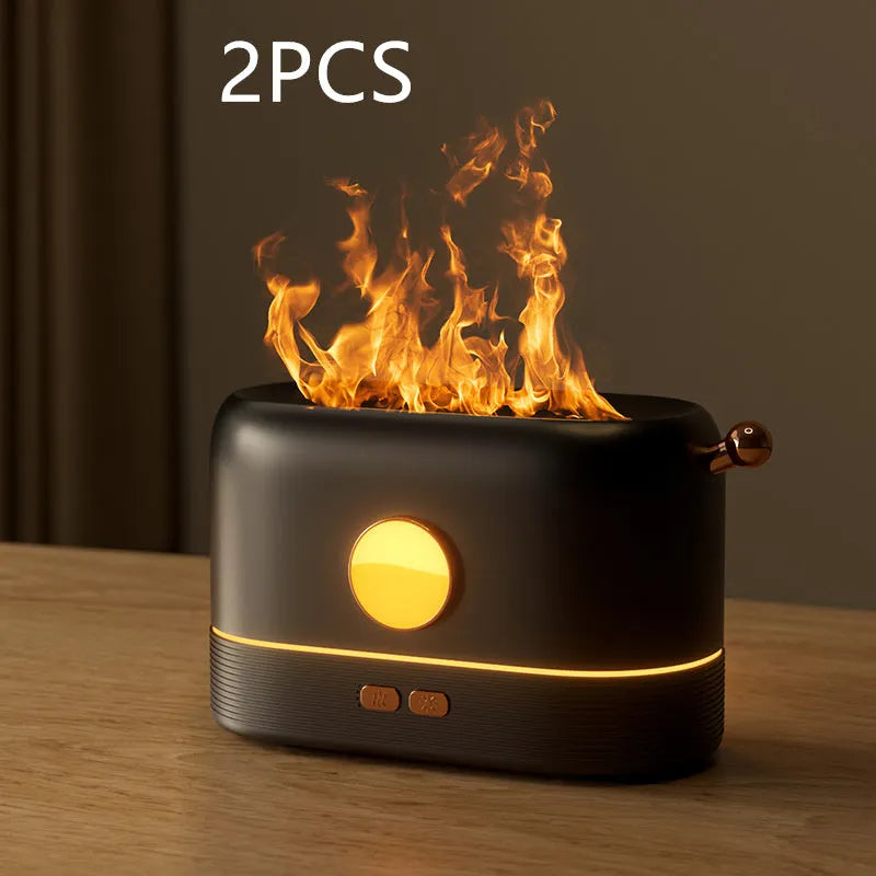 Black USB humidifier with flame simulation effect on wooden desktop