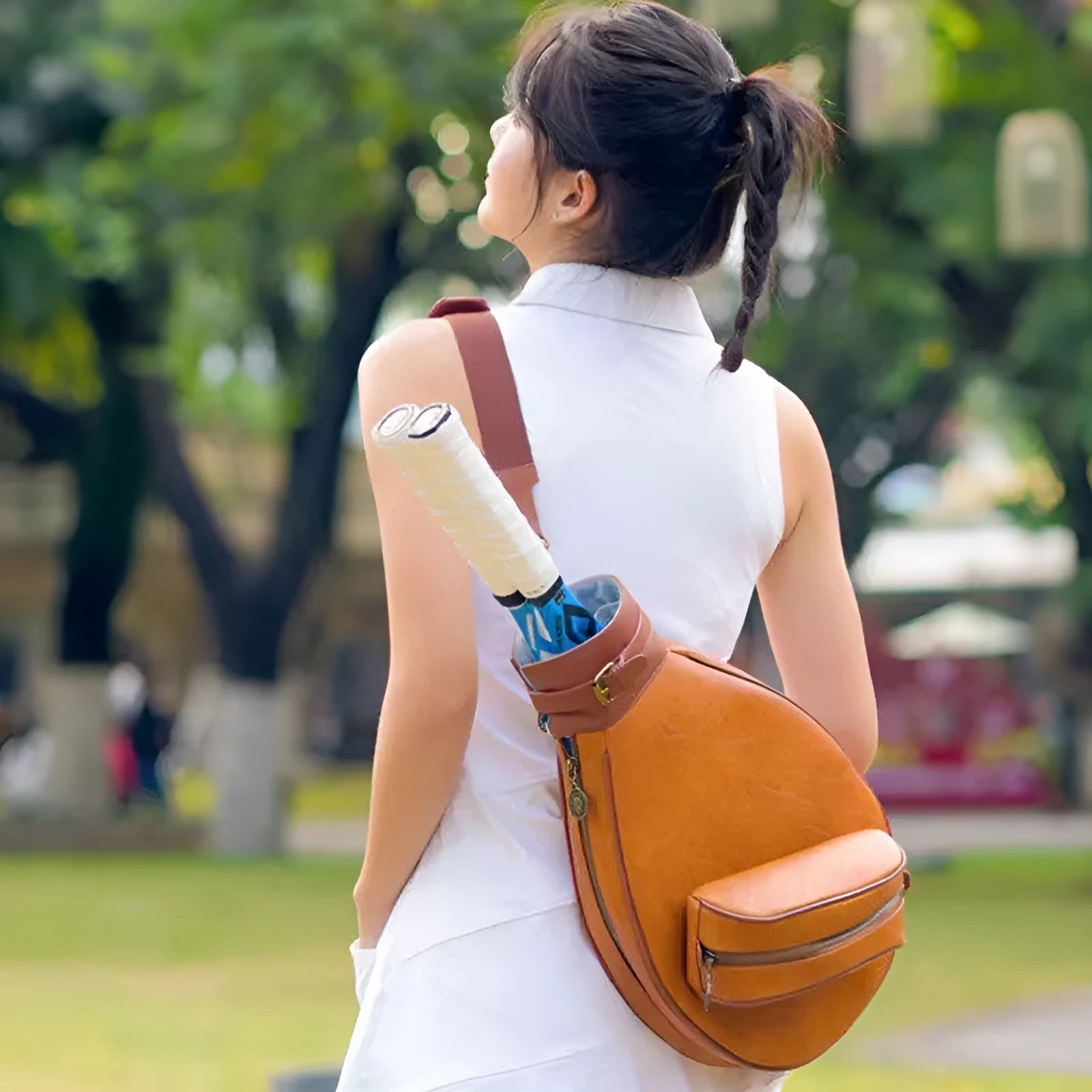 Women's vintage leather badminton bag with a one-shoulder strap in a selection of colours.