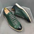 Men's black embossed pattern low-top lace-up trainers on a white background
