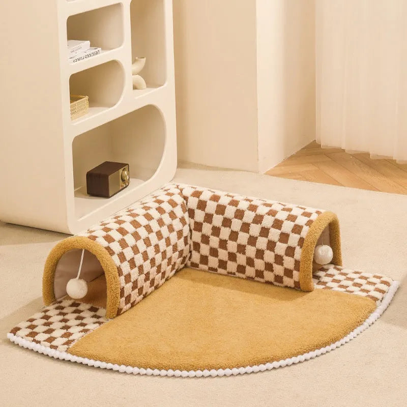 Brown plaid cat tunnel bed with central mat showing collapsible tunnel design