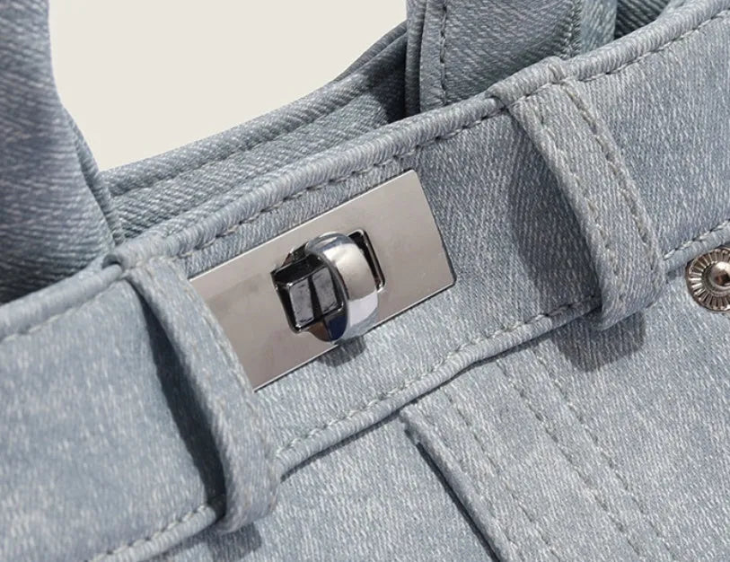Women's denim-style shoulder bag in soft PU material with standard size and polyester lining