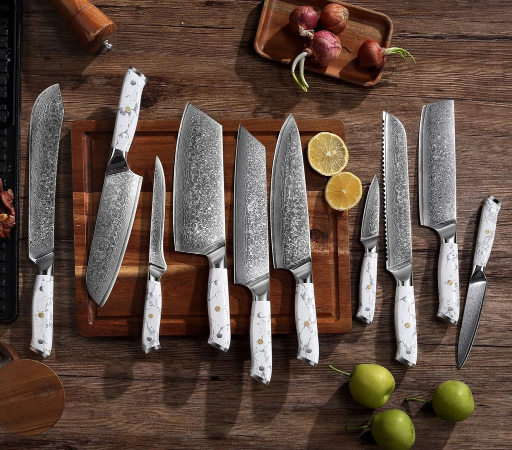 Damascus pattern chef's knife with 32cm total length on kitchen counter