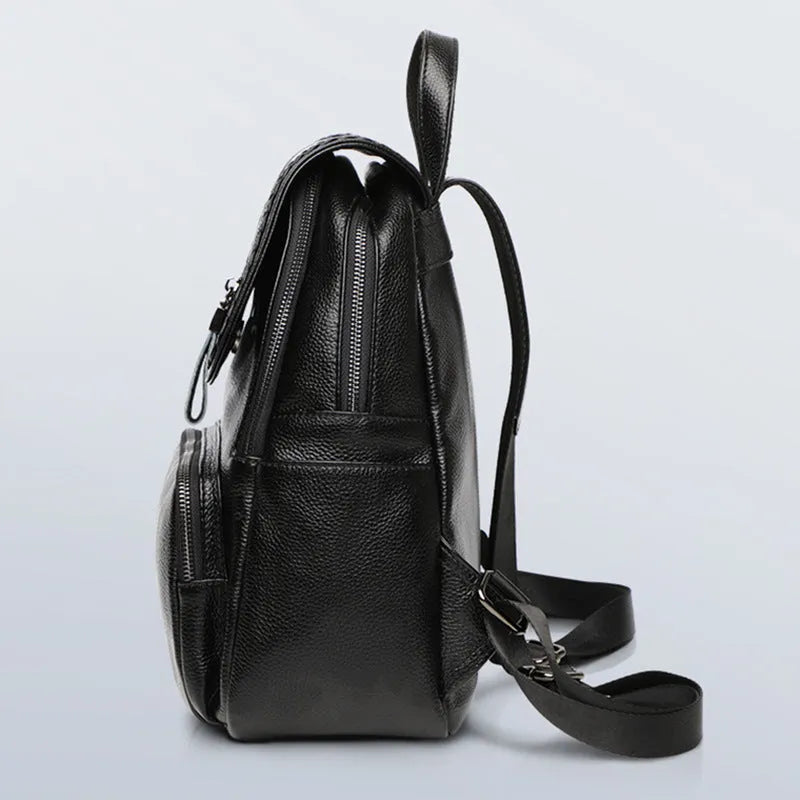 Solid colour genuine leather women's backpack with front sandwich pocket in blue.