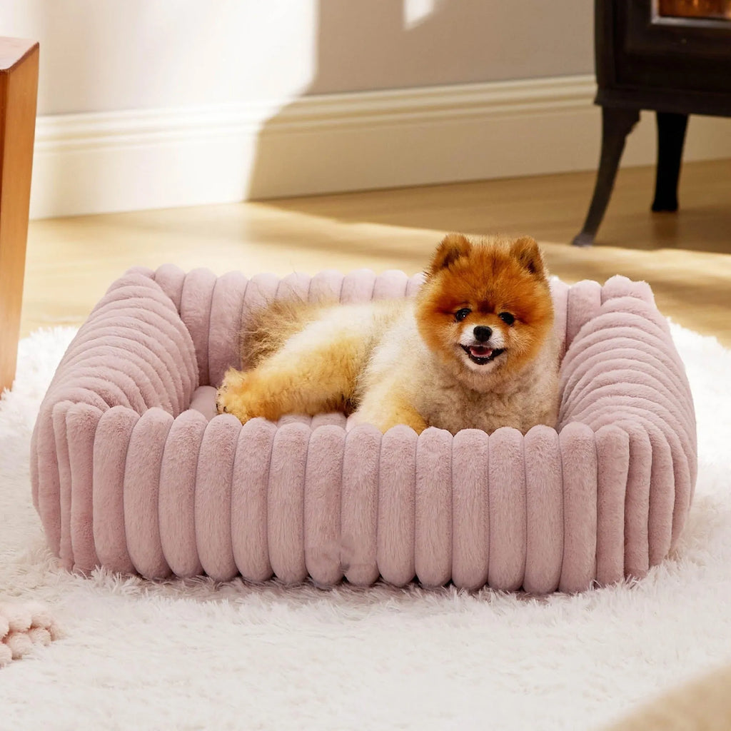 Soft winter dog bed cushion in beige colour showing raised sides and plush sleeping surface