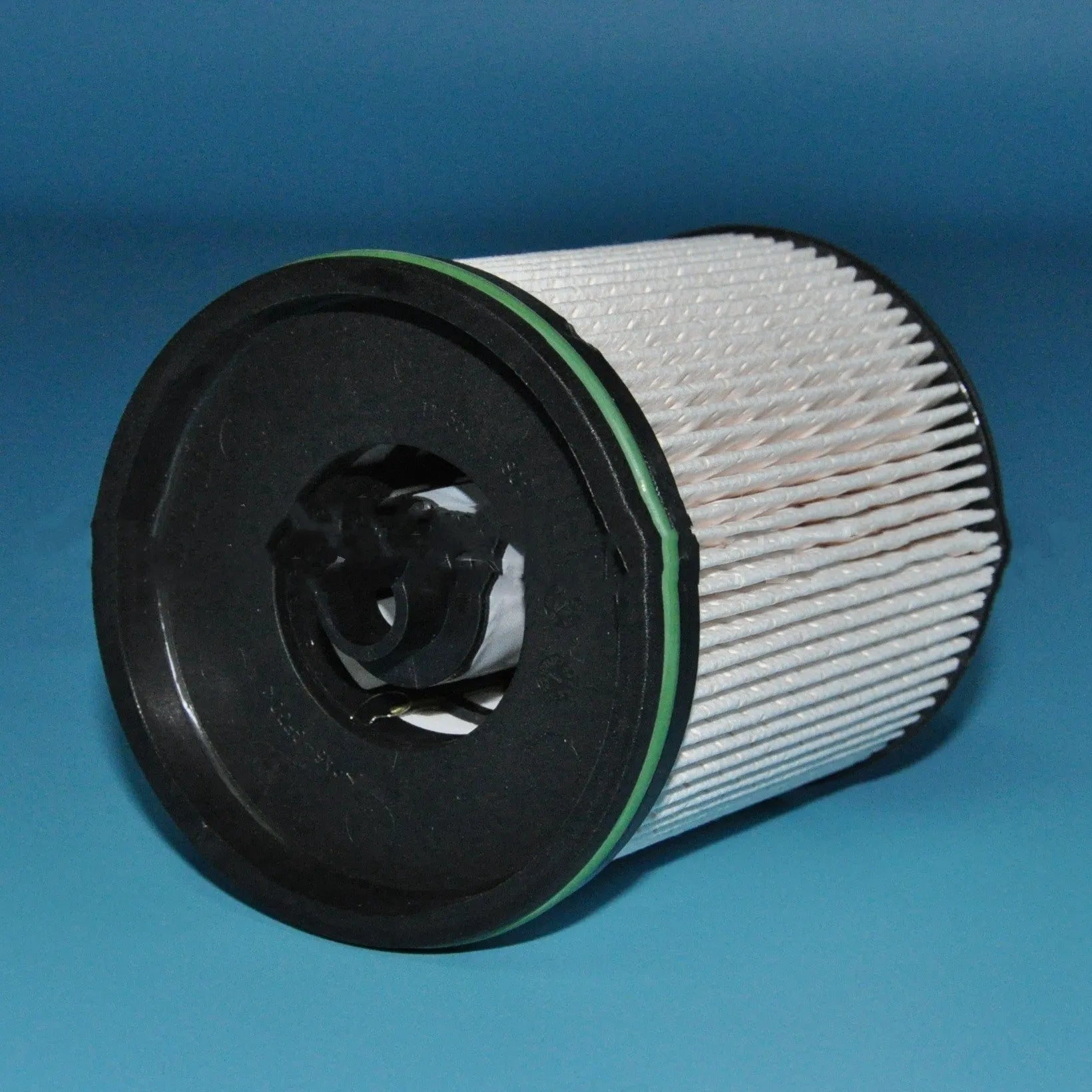 Diesel fuel filter element with gasket for Vauxhall and Opel Astra models showing 106mm height