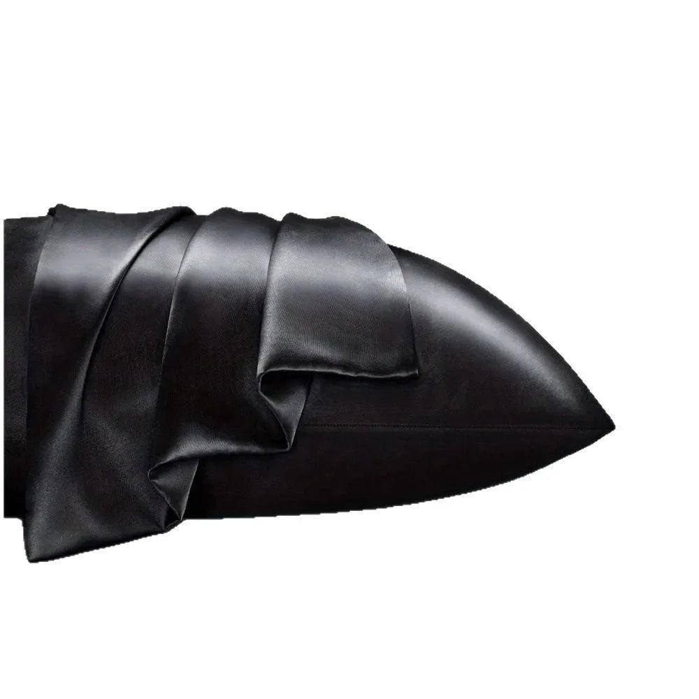A pair of solid colour satin cloth pillowcases made from polyester plain weave fabric.