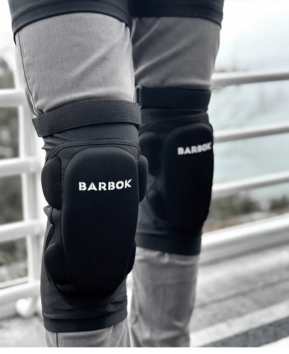 Black adult hip pad for sports protection, showing adjustable waistband and NBR padding on Spandex material.