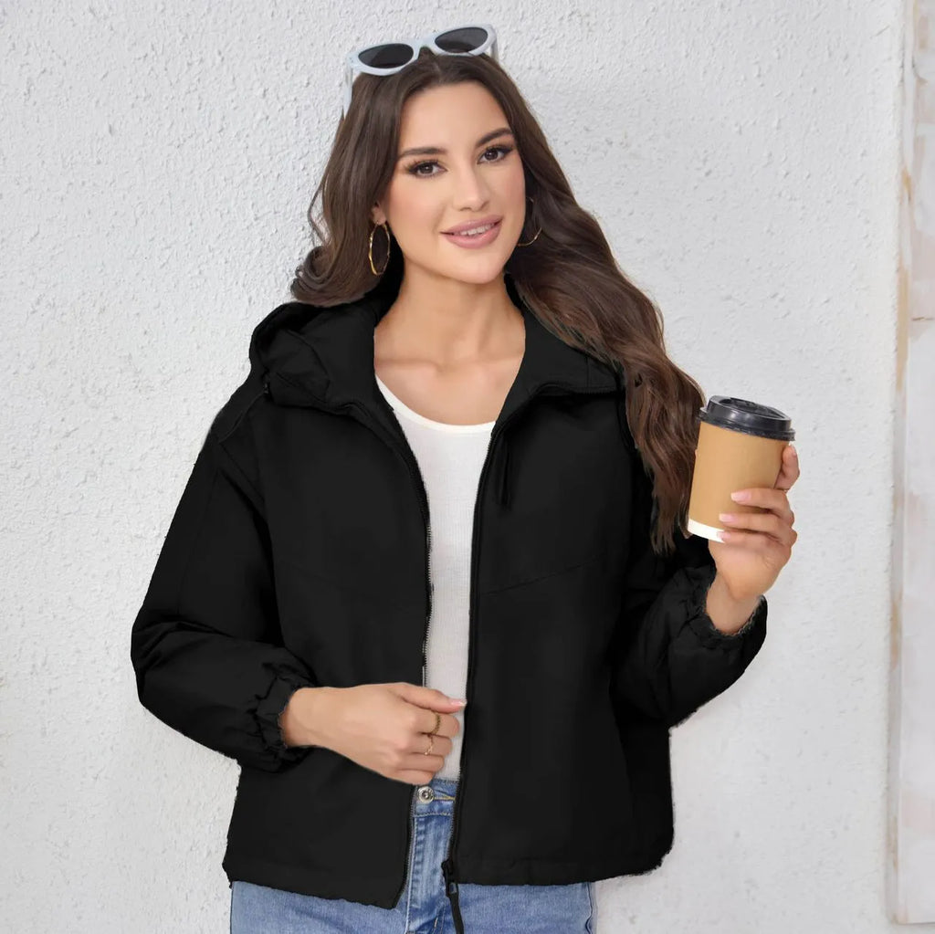 Women's grey hooded loose-fit polyester shell jacket with long sleeves