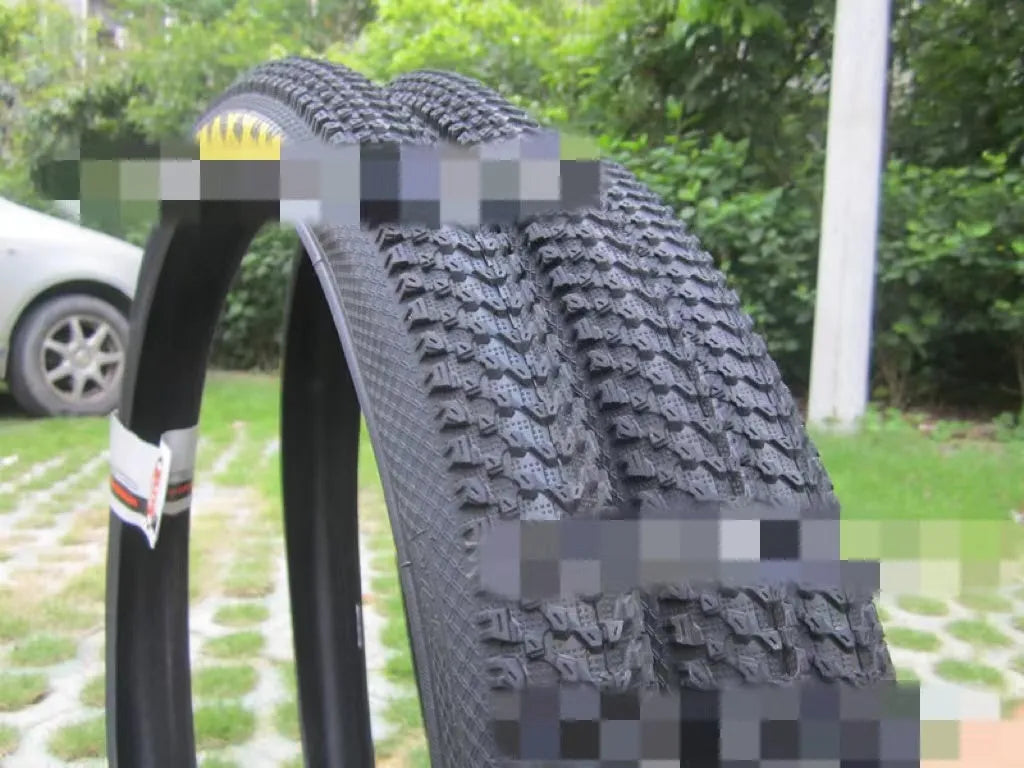 Mountain bike ultralight puncture-proof tyre shown in multiple sizes for 26, 27.5, and 29-inch wheels.