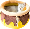 Pink honey pot shaped cat sofa bed with soft interior and a removable cushion for small pets.