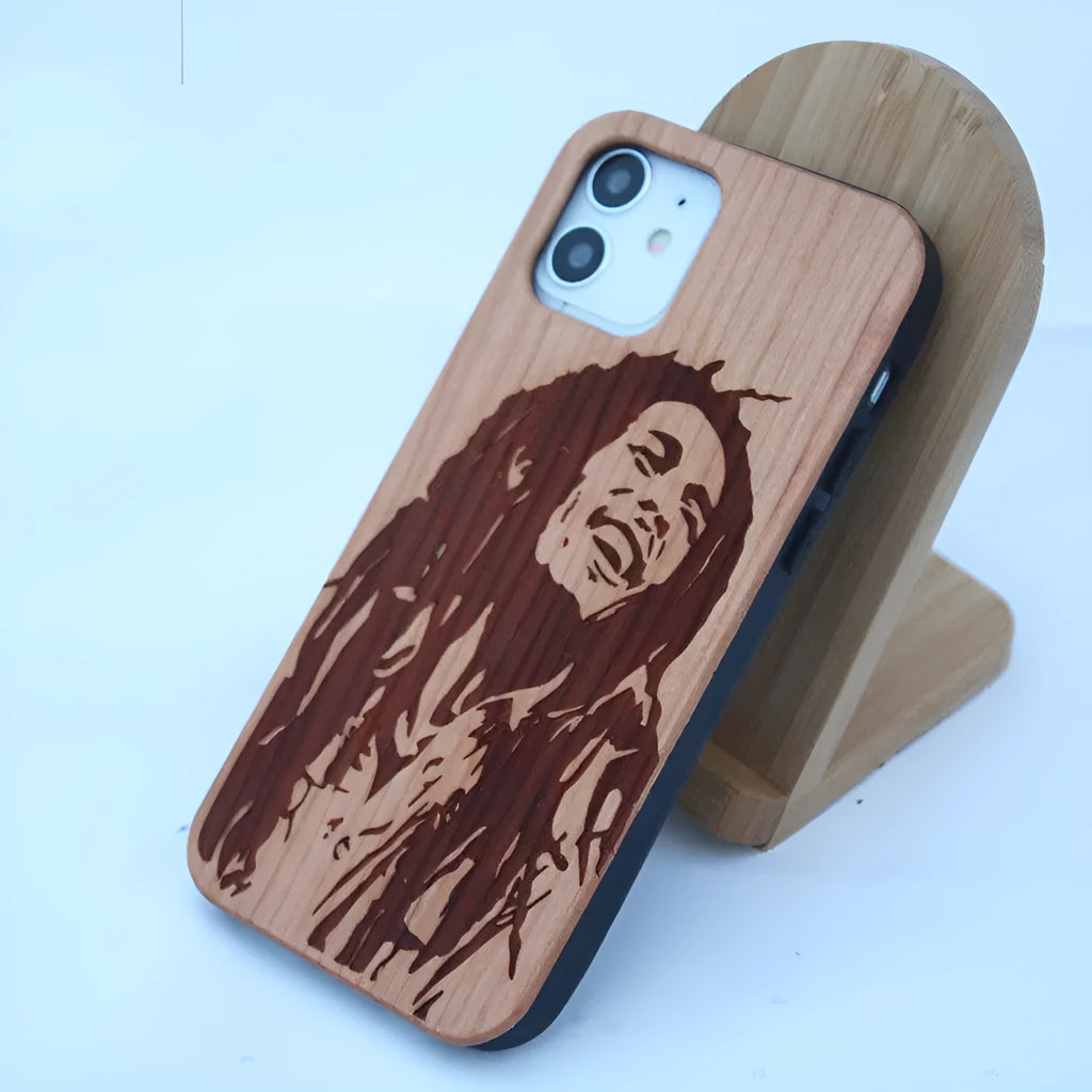 Wooden mobile phone case with solid wood back panel and TPU bumper, showing elephant print design for iPhone