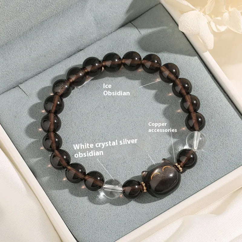 Women's cat head charm bracelet with 8mm Ice Stone on natural silver stone setting.