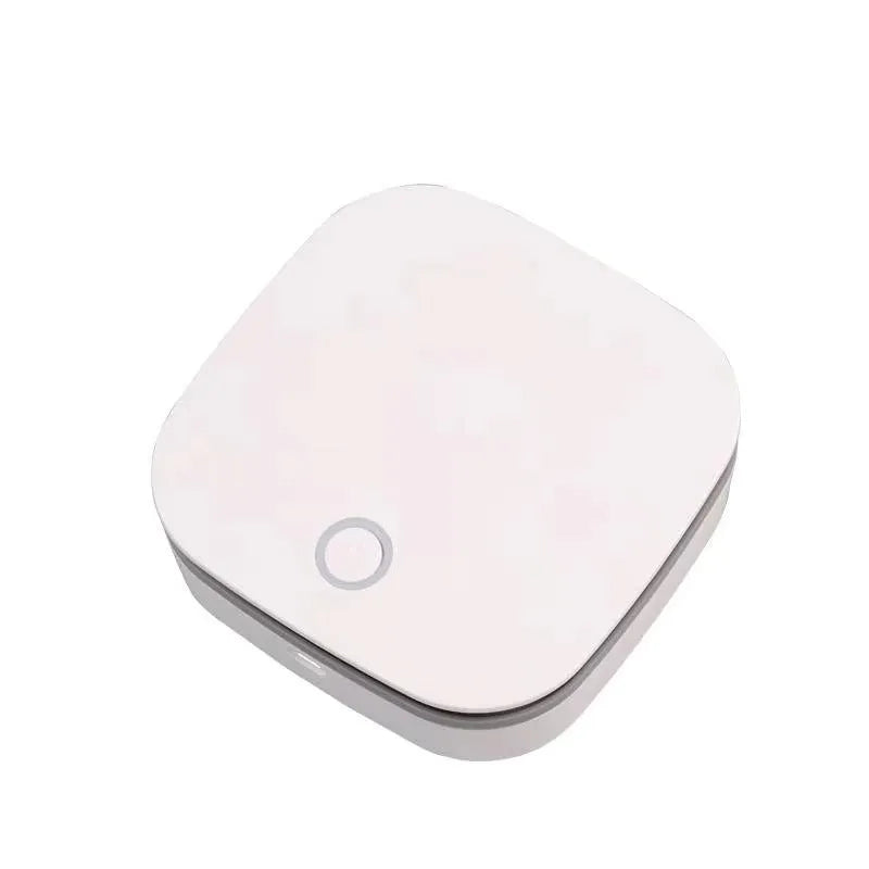 White portable USB air purifier with button control for car and small room use.