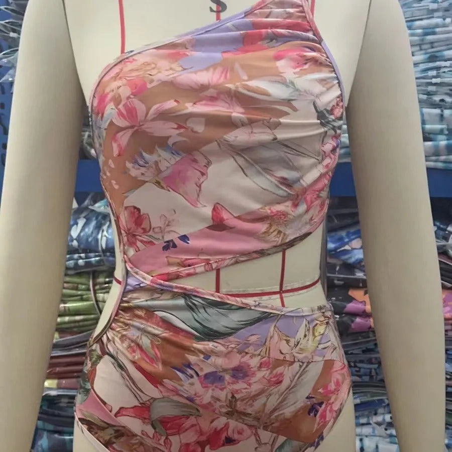 Women's rose gold patterned swimsuit made from polyester fibre in various sizes