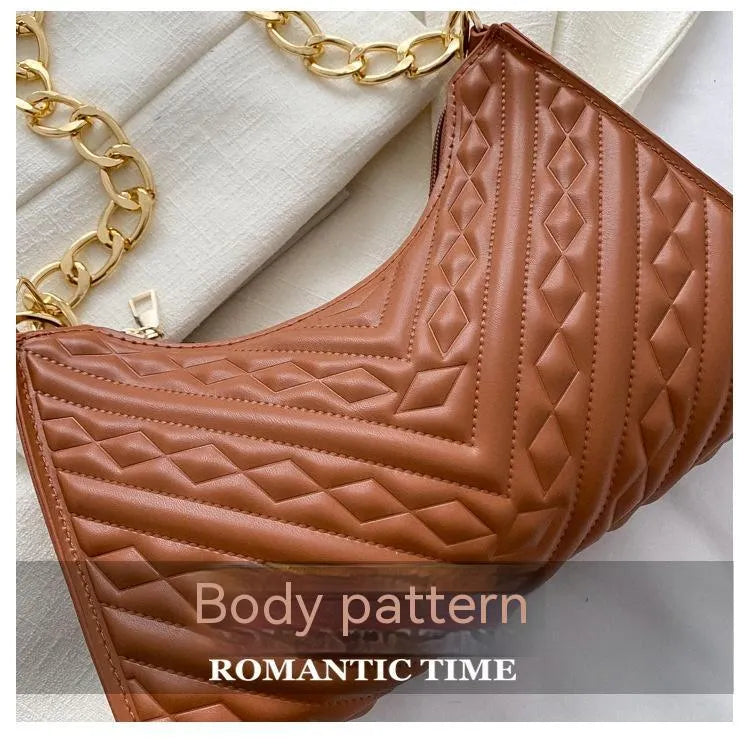 Brown PU leather pleated chain baguette shoulder bag showing adjustable strap and square shape