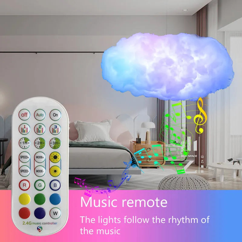 White fabric cloud shaped ambient light with colourful LED lighting, hanging from ceiling with USB cable.