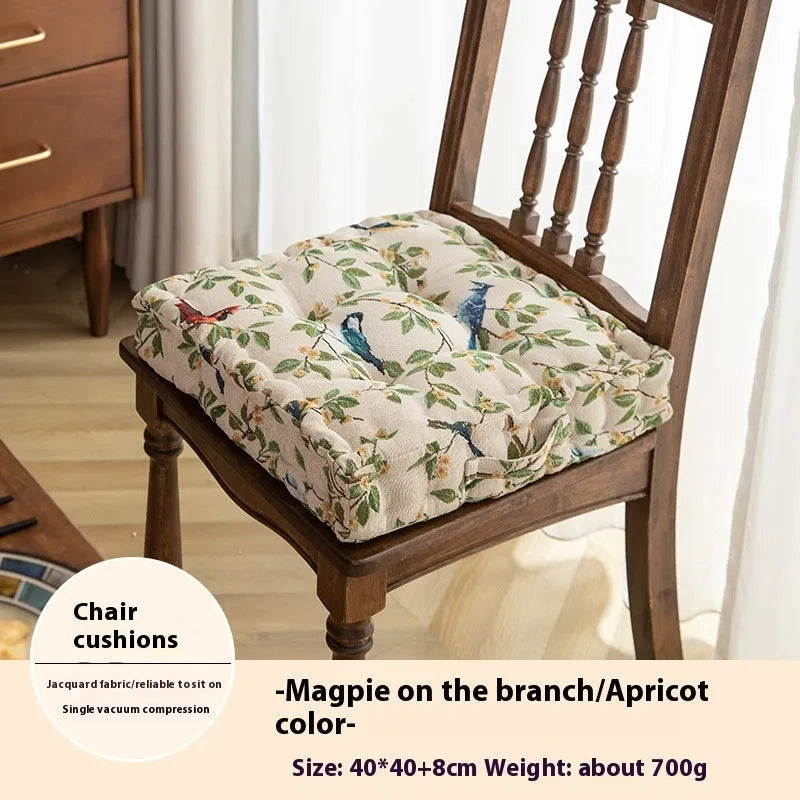 American dining chair cushion 40x40x8cm in apricot floral pattern on a chair.