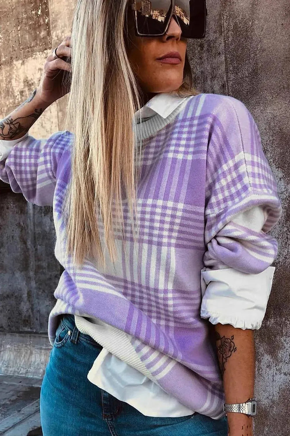 Lilac plaid print loose-fitting women's sweater with long sleeves and ribbed trim.