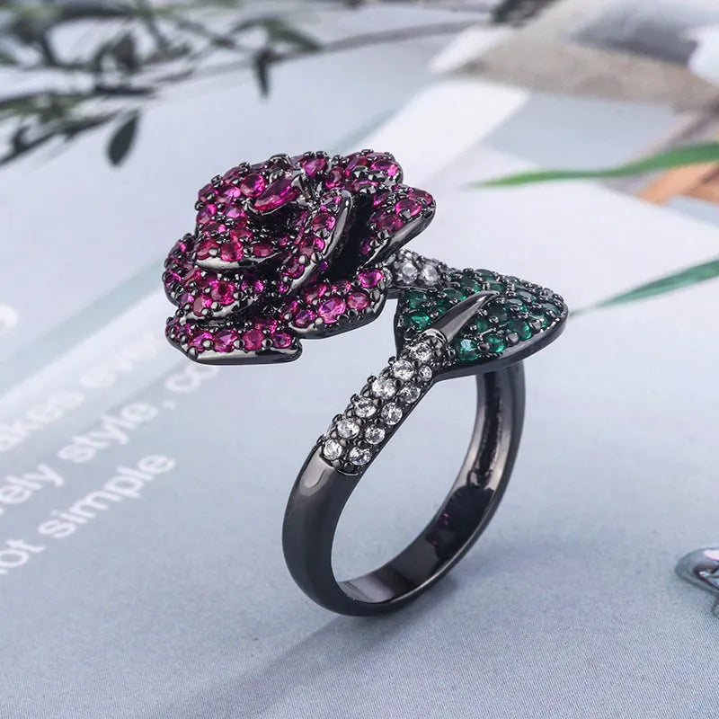 Black gold geometric flower ring with simulated red corundum stones on copper base