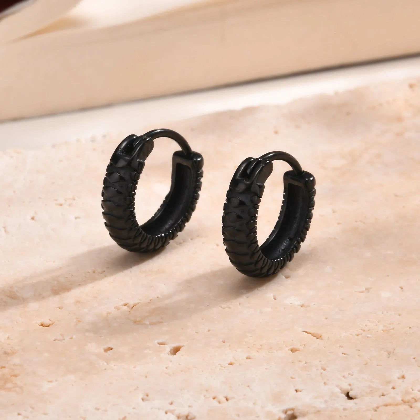 Men's stainless steel snake pattern stud earrings in black or gold colour