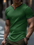 Men's colour-block V-neck short-sleeve sports T-shirt on a hanger, showing waffle texture and multiple colour options.