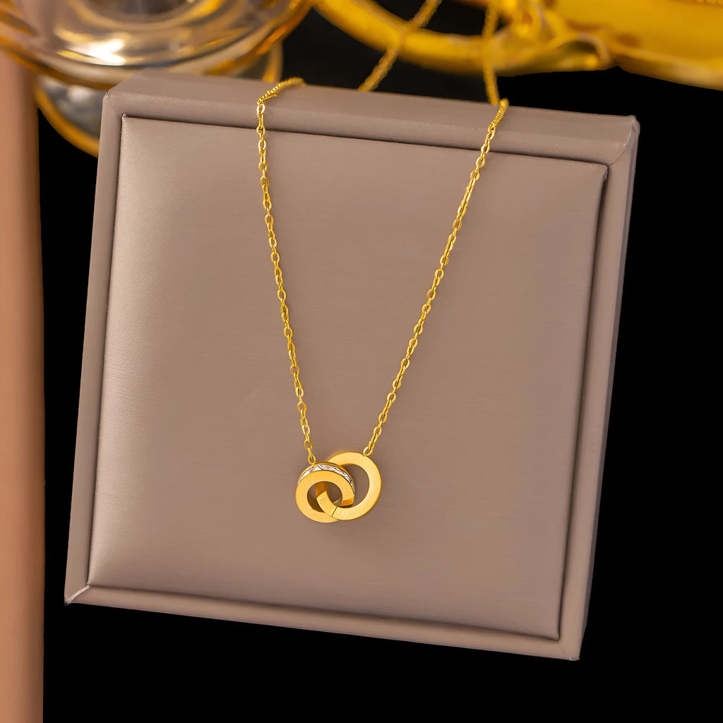 Gold titanium steel necklace with double ring pendant on a regular chain, listed as 37 H6012