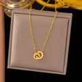 Gold titanium steel necklace with double ring pendant on a regular chain, listed as 37 H6012