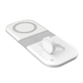 White folding dual magnetic desktop wireless charger with two USB Type C ports on a desk