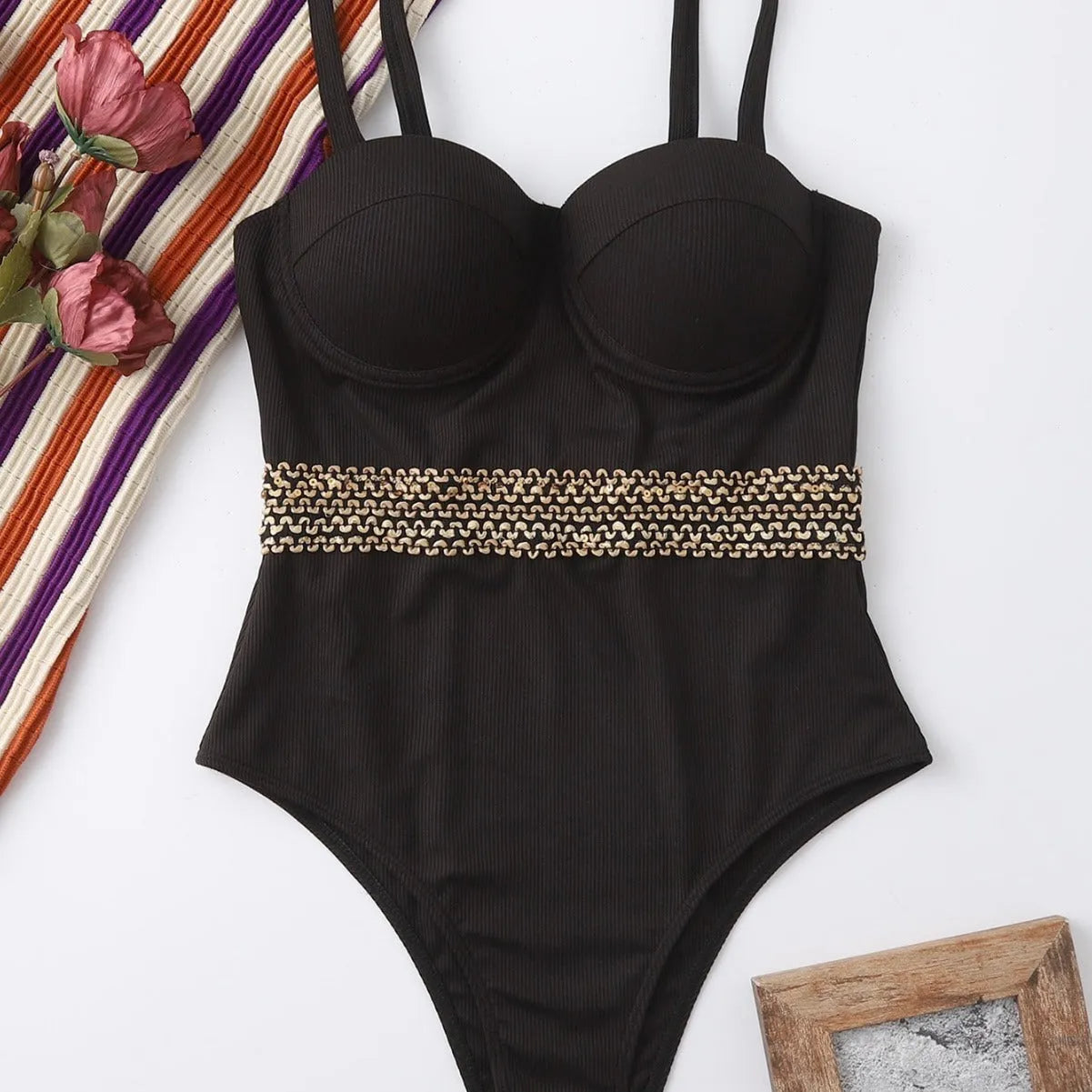 Black one-piece women's swimsuit with adjustable shoulder straps