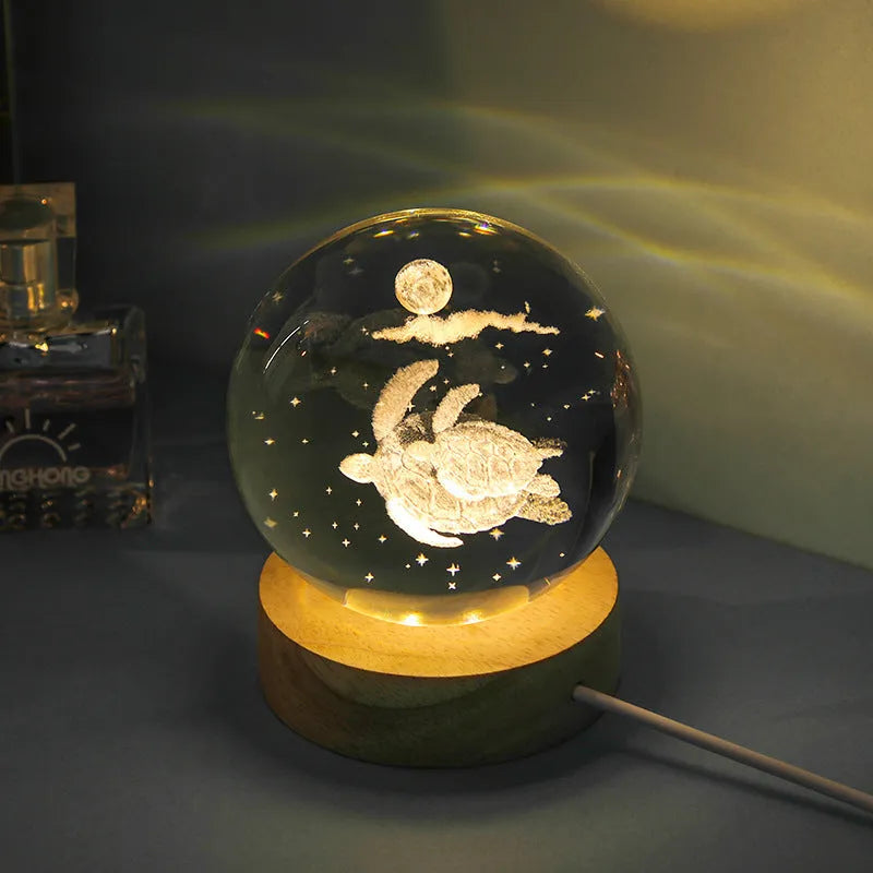 Transparent crystal ball night lamp with 3D carved jellyfish design, showing 6cm size on round base.