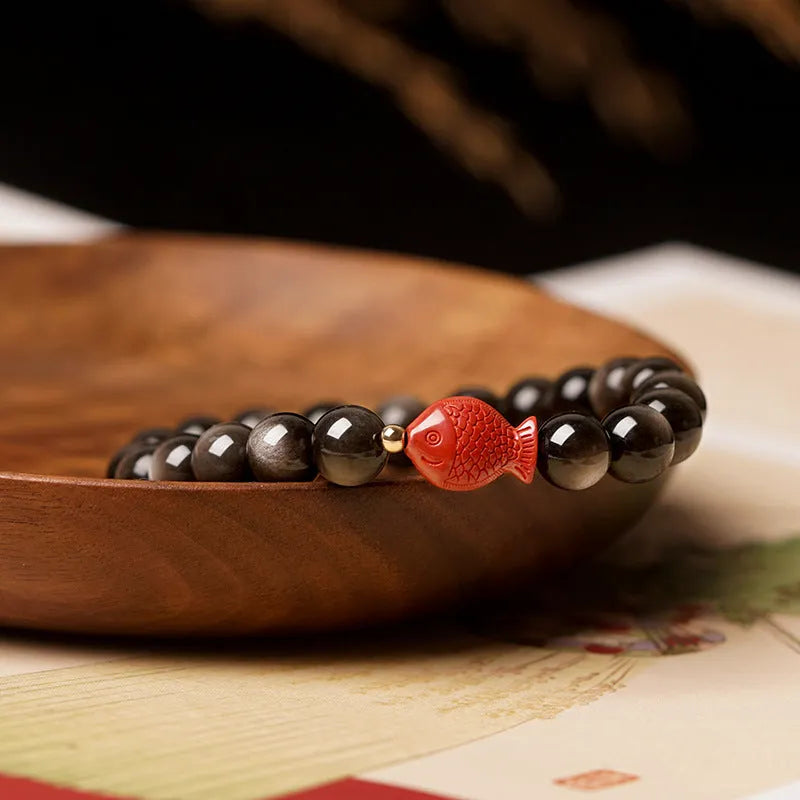 Natural obsidian round bead bracelet with red cinnabar accents and fungus decorative elements