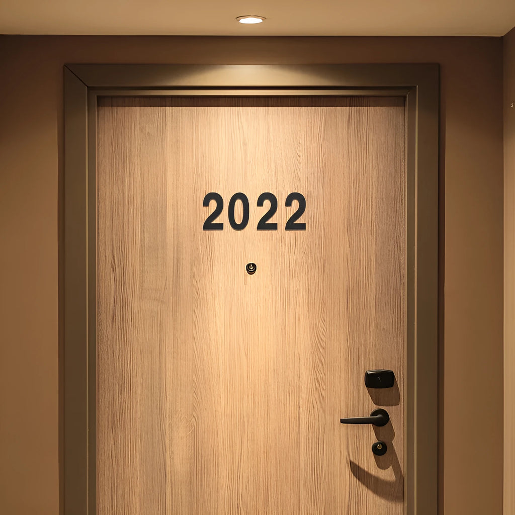 Black stainless steel sticky house numbers showing 7.5cm characters including letters and numbers