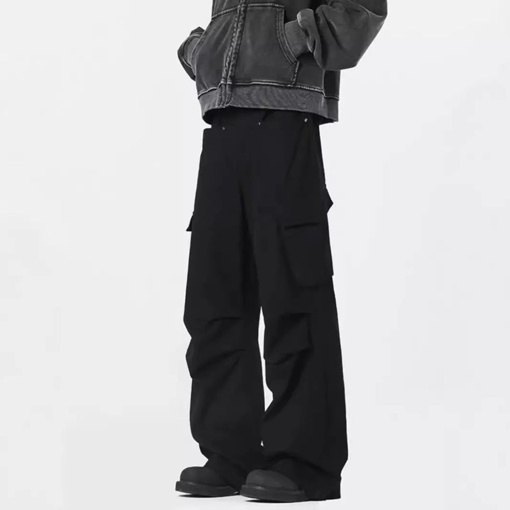 Men's straight casual trousers in black with high waist and cardigan button opening detail