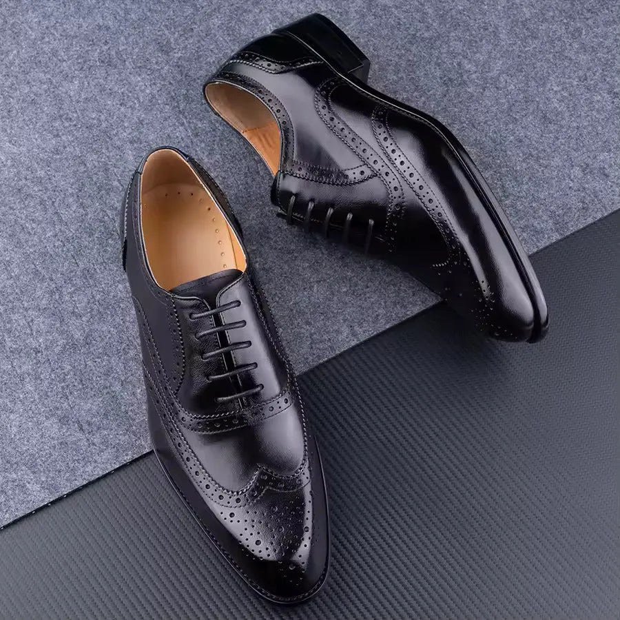 Men's purple Oxford shoes with hand-carved leather detailing and pointed toe