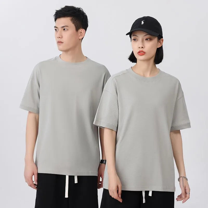 Men's loose fit short sleeve cotton pique t-shirt on a hanger in a choice of colours.
