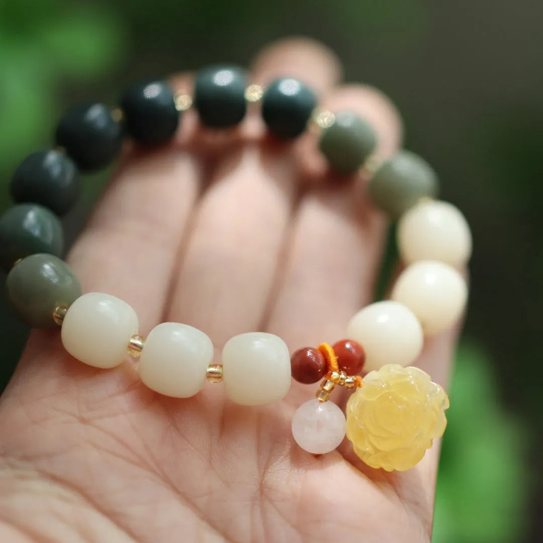 Gradient white jade Bodhi root bracelet with 10mm flower beads and natural beeswax lotus detail